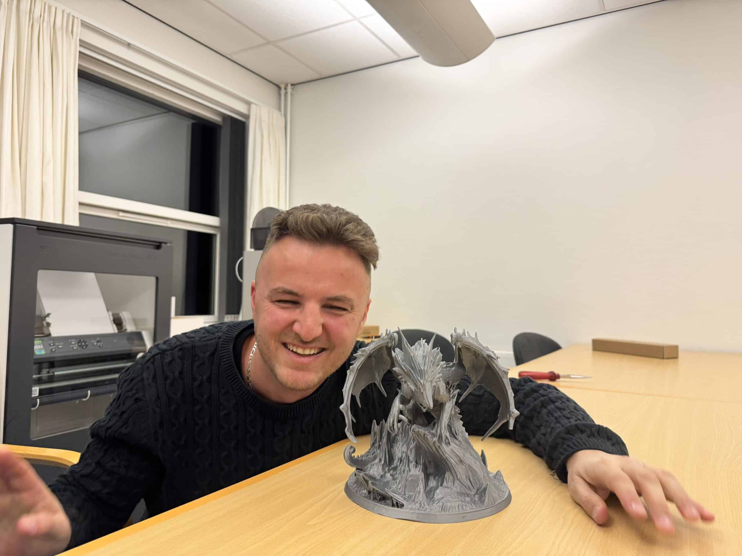 Edis showcasing a majestic 3D-printed dragon